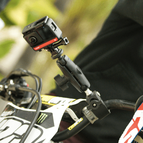 Insta360 camera mounted on motorcycle handlebars using the Claw Mount from the Motorcycle Mount Bundle