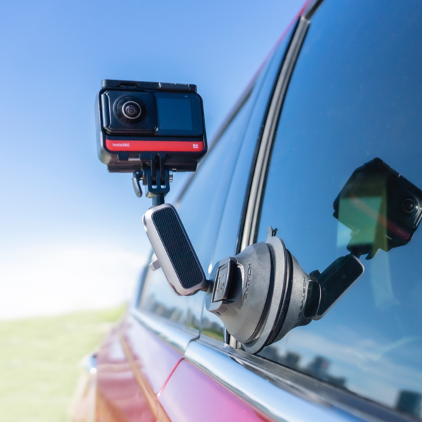 Insta360 camera mounted to the window of a car using the Suction Cup Car Mount. Allows the user to get cool driving shots.